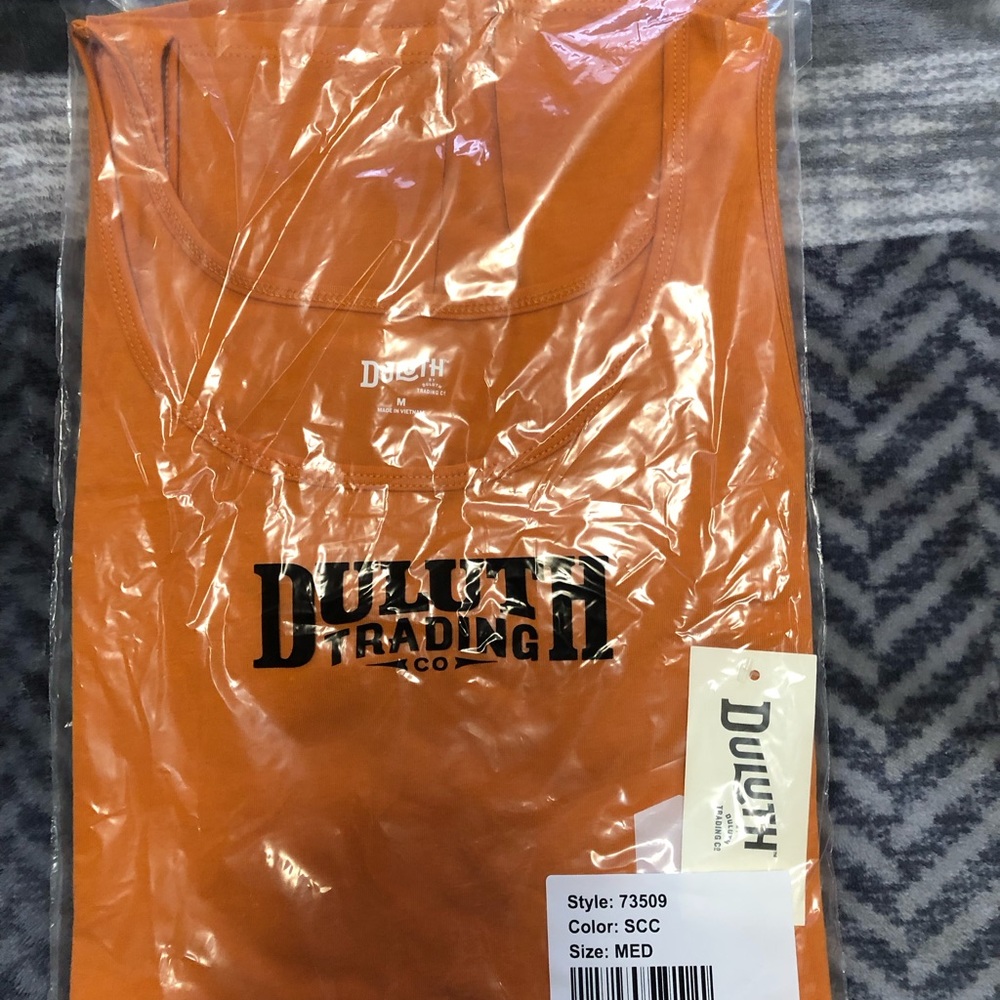 Brand new in package Duluth Trading “No Yank” Tank.  Size medium